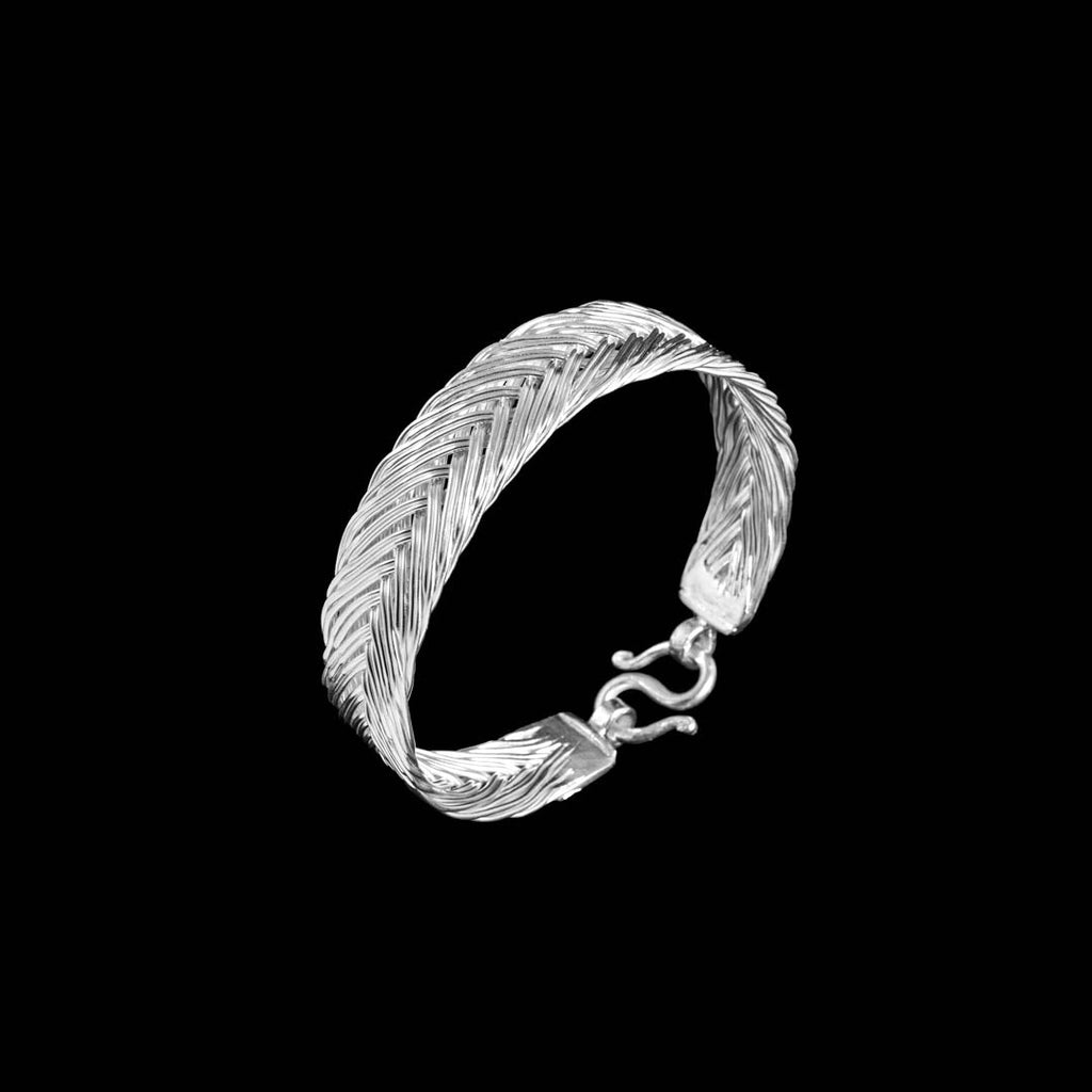 bracelet argent massif réalisé en tressage régulier de fils d'argent pur pour femme