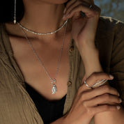collier en argent massif N°04 : chaine fine en argent massif et petit pendentifs poissons en argent massif - Itsara Bijoux