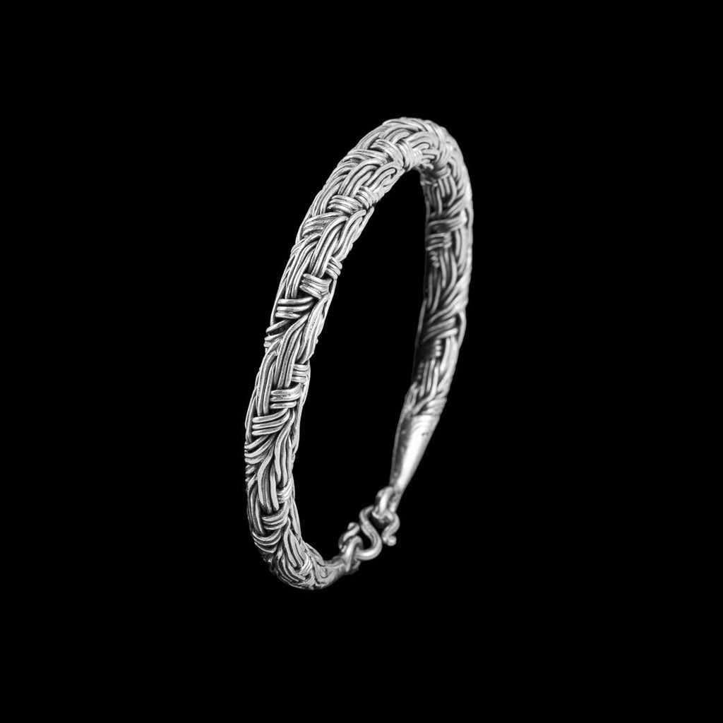 bracelet en argent massif réalisé en tressage de nombreux fils d'argent pur pour homme