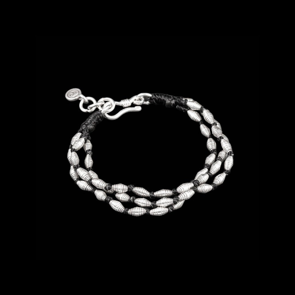 Bracelet souple en argent N°09 - Itsara bijoux14 cmBracelet artisanal souple N°09 en coton ciré avec perles en argent massif