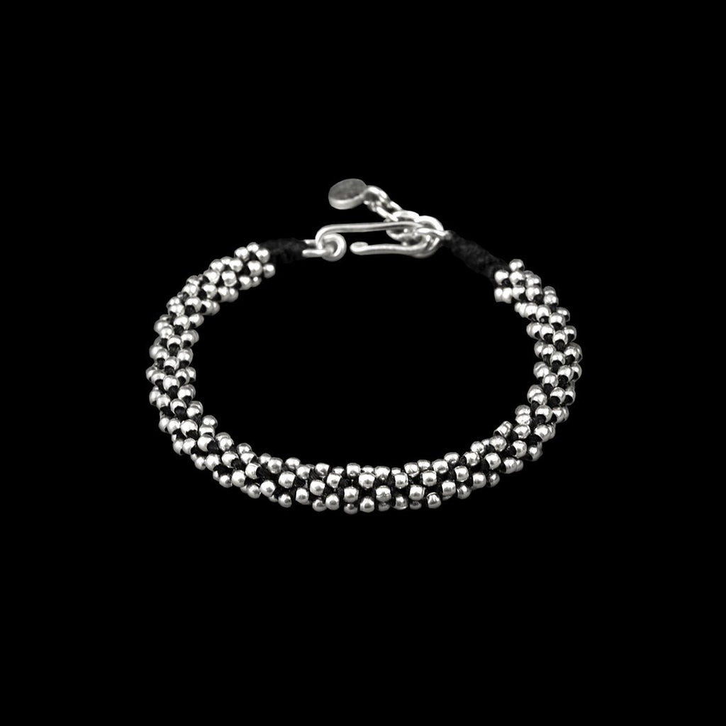 Bracelet souple en argent N°21 - Itsara bijoux13.5 cmBracelet artisanal souple N°21 en macramé de coton ciré avec perles rondes en argent massif
